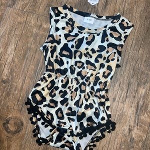 Boutique onsie with poms